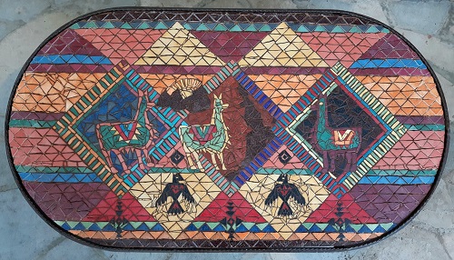 Table basse en mosaïque aux motifs lamas et condors réalisée en Emaux de Briare Harmonie